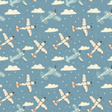 Pattern of airplanes and clouds on a blue background